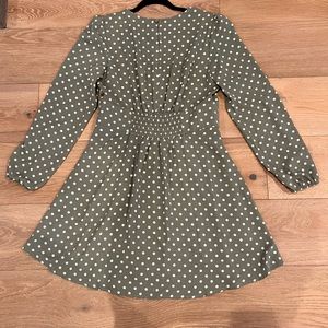 Light green polka dot dress with buttons at the waist.